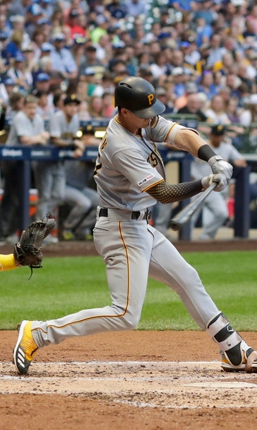 Newman homers, Pirates rally late to beat Brewers 3-2